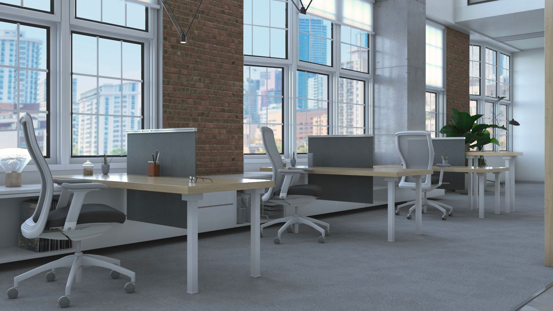 Modern loft office space with cubicles and chairs.